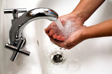 – 200812washing hands under faucet