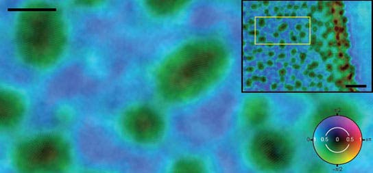 Oval shaped gold particles are 5nm diameter with lines, layers of atoms, across them.