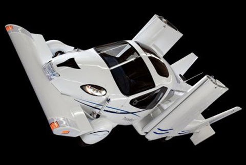 "It's more of a financial issue," said Calkins, "it takes a lot of capital to get a personal air vehicle to market, and the mood is that people want a faster return on their investment than a personal aircraft can offer." <strong>When Can I Get One:</strong> Calkins thinks that public lack of interest is abating. In crowded mega-cities like Mumbai and Mexico City, people have begun refusing to put up with traffic anymore. In fact, in Sao Paulo, Brazil, the traffic has gotten so bad, a number of helicopter taxi companies have sprung up, allowing the wealthier citizens to dodge the gridlock. <strong>Prediction:</strong> According to Calkins, within 25 years flying cars will be common in traffic-clogged metropolises like Los Angeles and Beijing, but it will be 50 years until you can hail a flying taxi to get across town in a less congested city like Chicago or New York. <em>[At right: In Terrafugia's Transition driving airplane, the canard wing doubles as the front bumper.]</em>