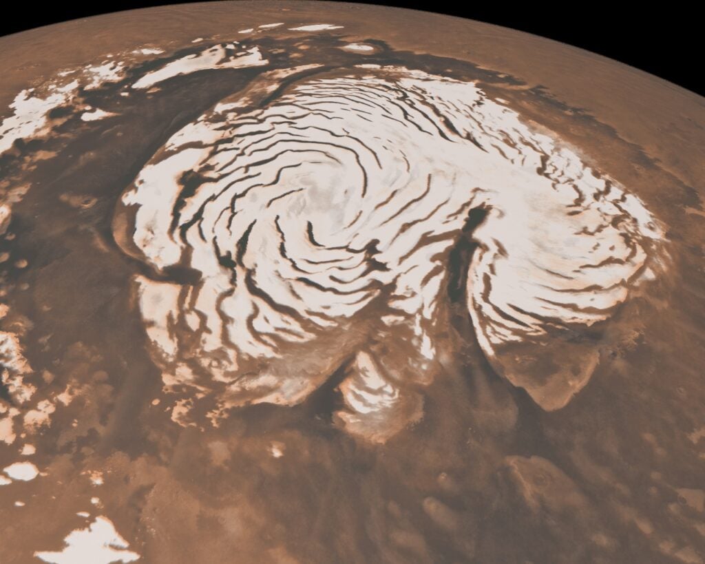 When humans begin colonizing Mars someday, Santa Claus can easily set up shop on our red next-door neighbor. Mars has <a href="http://www.nasa.gov/mission_pages/MRO/multimedia/pia13163.html">two polar ice caps</a>—a northern and southern one—that grow and shrink depending on the season. During the wintertime, the poles get absolutely no sun, and the resulting drop in temperature freezes both water into ice and carbon dioxide into "dry ice." Kris Kringle will be happy to know that the north polar cap is the larger of the two poles, reaching about 685 miles wide during its winter season. <strong>Temperature:</strong> -238 degrees Fahrenheit