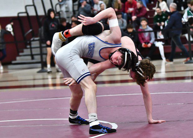 Kennet's Blake Boyer wriggles free for an escape against Central Bucks West's Patrick Kelly (BILL RUDICK for MedaNews Group)