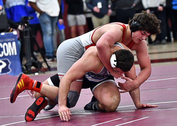 Owen J. Robert's Dean Bechtold rides out Quakertown's Calvin Lachman in the 285 pound final (BILL RUDICK for MedaNews Group)