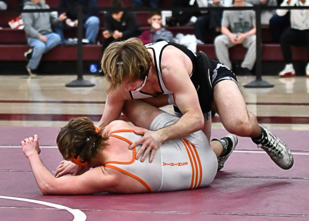 Strath Haven's Michael Spielman gets a takedown against Perk Valley's Carter Euker (BILL RUDICK for MedaNews Group)