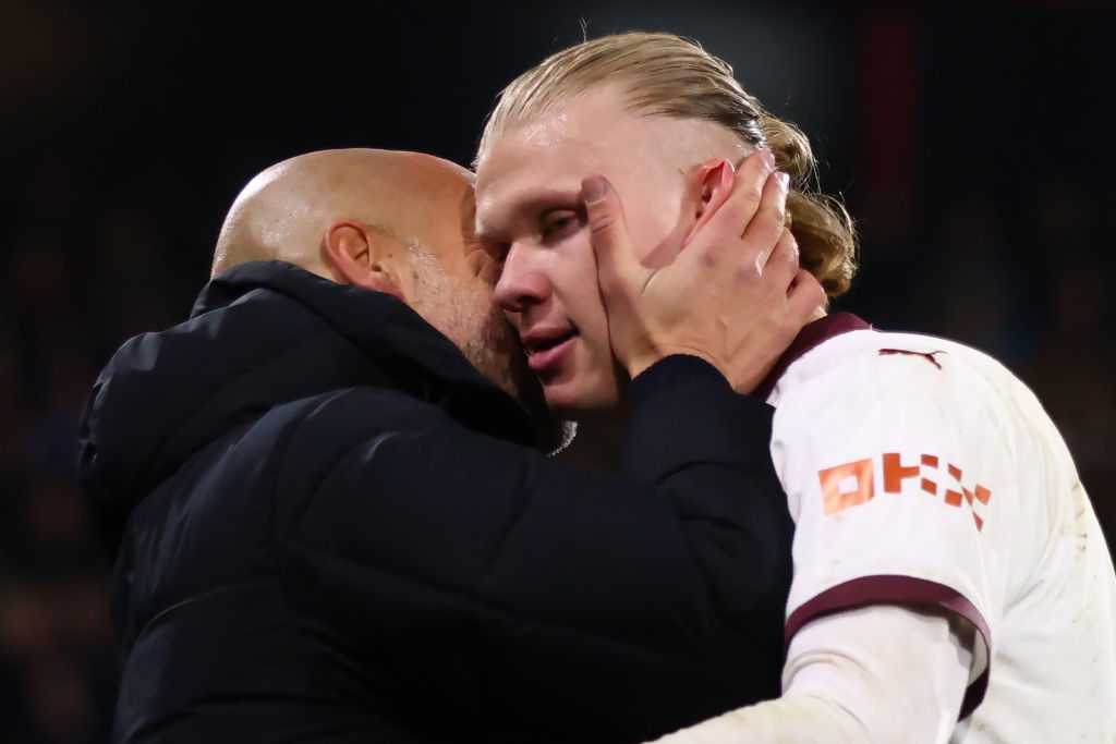 Pep Guardiola and Erling Haaland