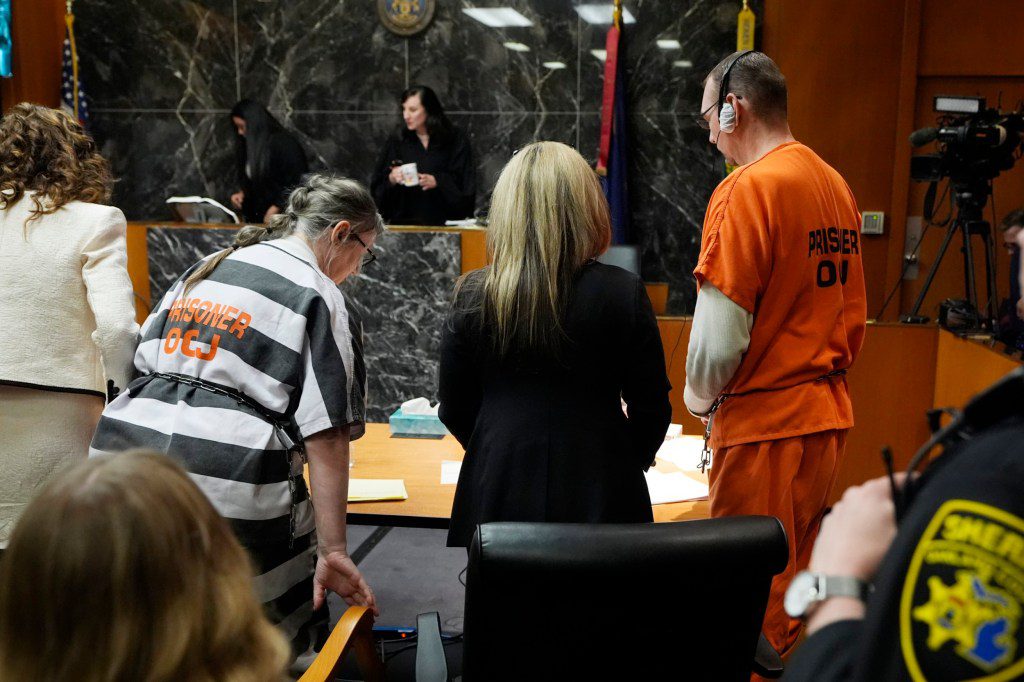 James and Jennifer Crumbley are seated before Judge Cheryl Matthews before their sentencing 