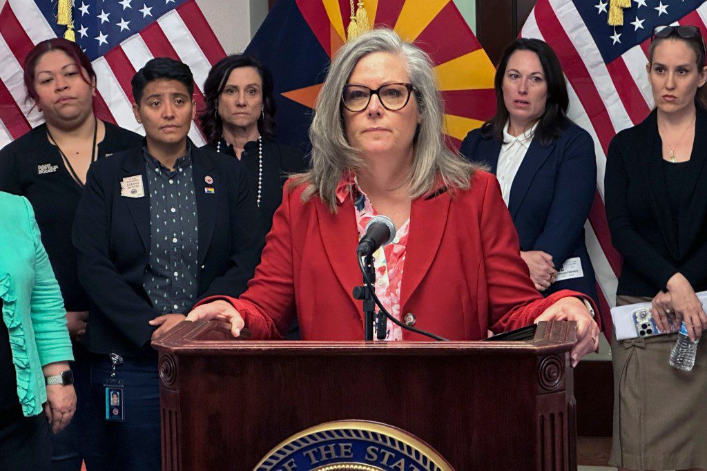 Arizona Governor Katie Hobbs speaks to reporters at the state capitol in Phoenix on Tuesday