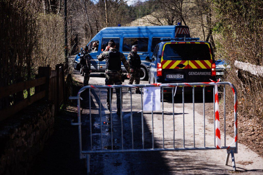 French Gendarmes secure a perimeter around the French southern Alps tiny village of Le Haut-Vernet, in Le Vernet on April 2, 2024, two days after French investigators have found the