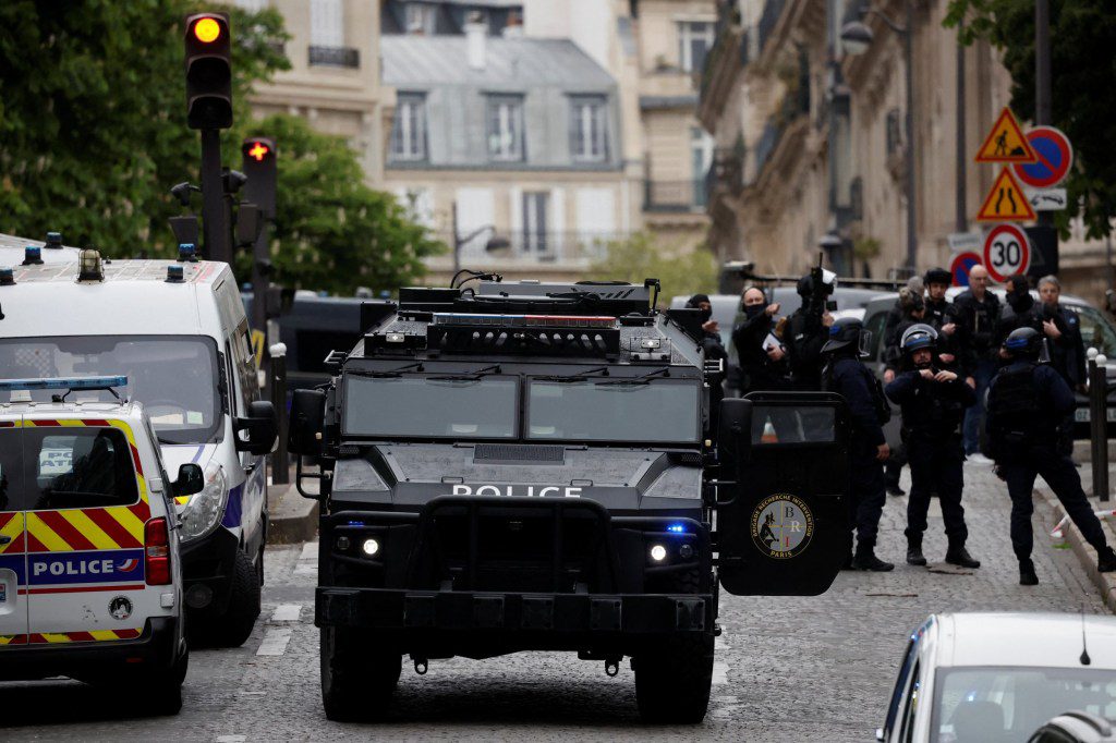 French police and members of French special police forces of Research and Intervention Brigade (BRI) secure the area near Iran consulate where a man is threatening to blow himself up, in Paris, France, April 19, 2024. REUTERS/Benoit Tessier