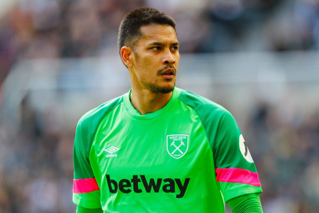 Alphonse Areola of West Ham United carrying an injury before half-time