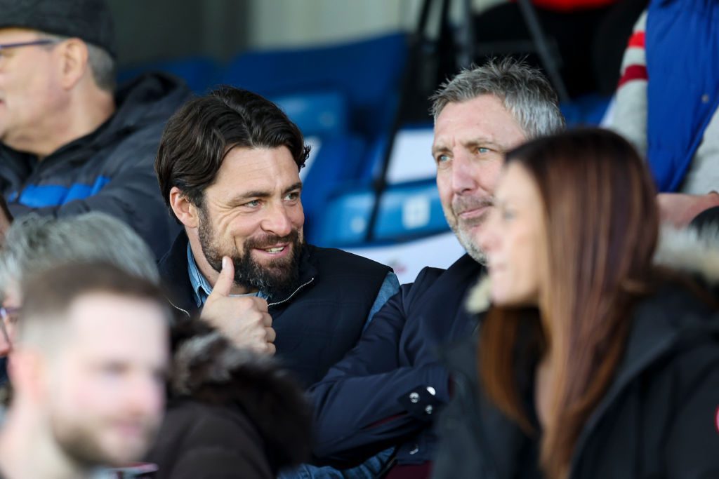 Jason Wilcox looks on