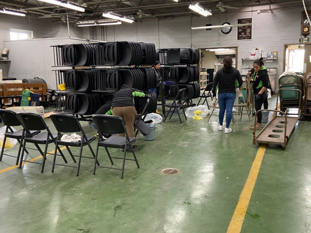 Cleaning crew inside a building