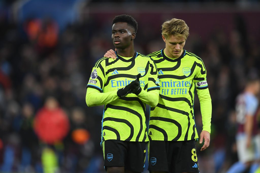 Bukayo Saka and Martin Odegaard pictured in action for Arsenal against Aston Villa