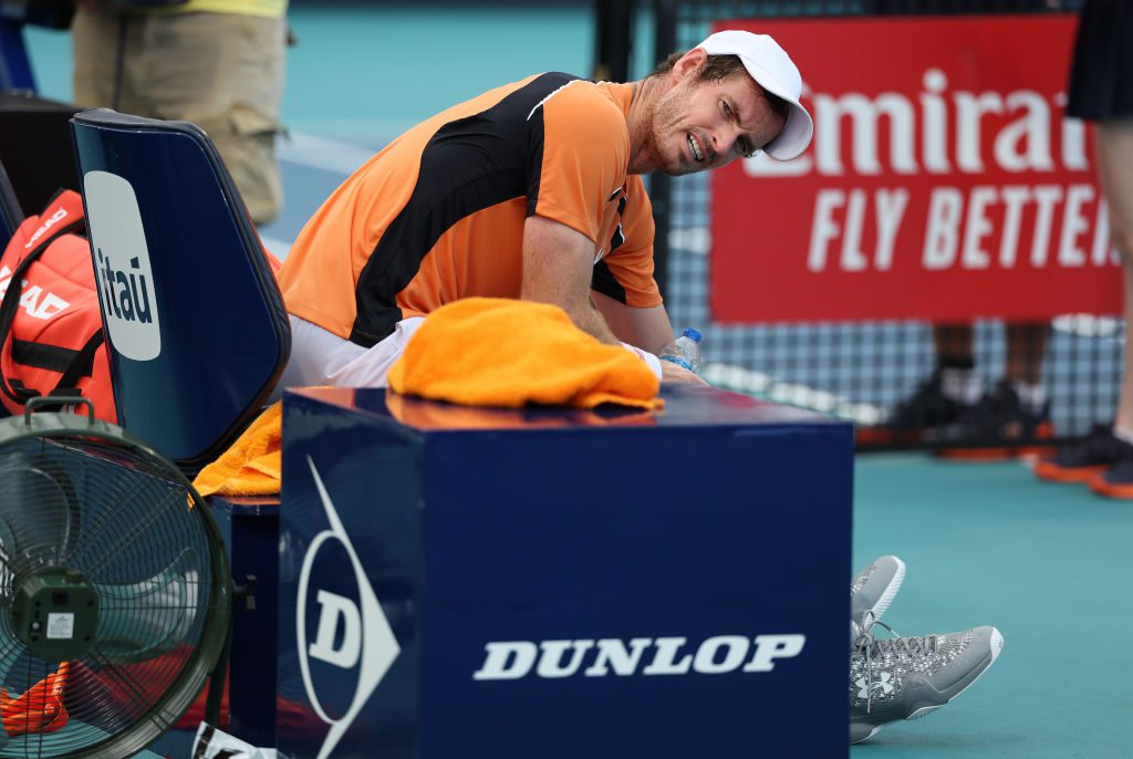 Andy Murray sat on his bench at the Miami Open looking in pain
