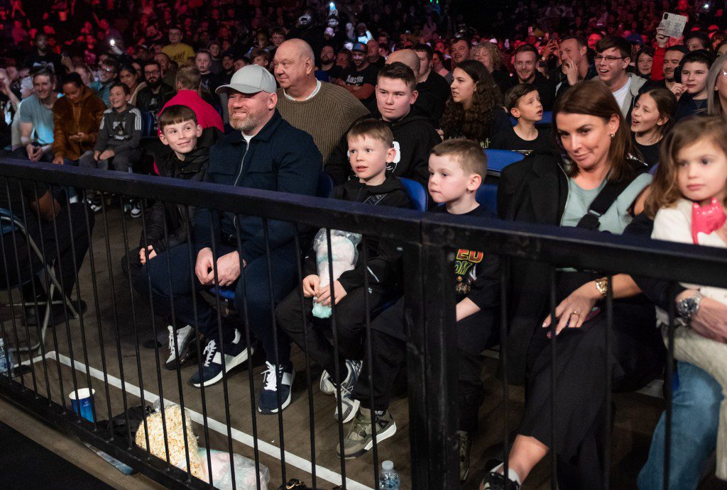 Wayne Rooney, Coleen Rooney and their family take in the action at WWE Live in London