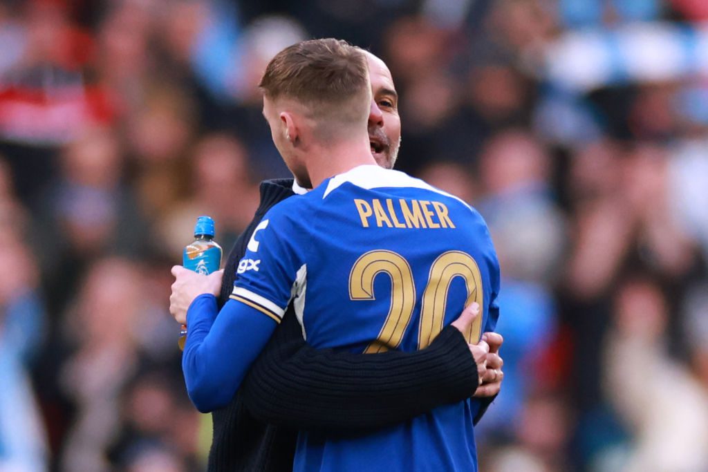 Cole Palmer was consoled by Pep Guardiola after defeat 