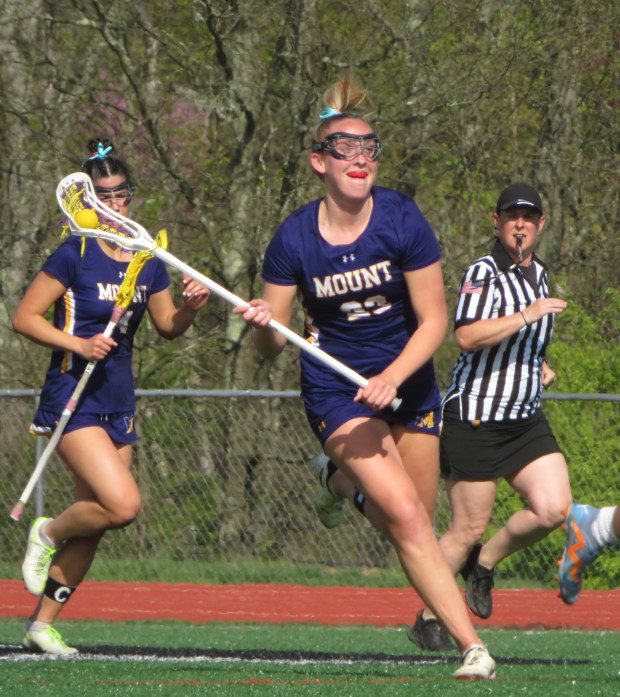 Mount Saint Joseph Academy's Amelia Clark brings the ball into the offensive end against Gwynedd Mercy Academy Tuesday, April 23, 2024. (Ed Morlock/MediaNews Group)