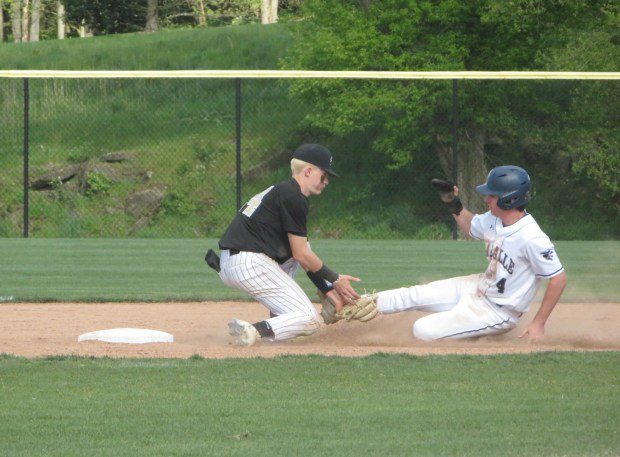 Neumann-Goretti's Billy Smith tags out La Salle's Jake McNesby, who was trying to advance to second base on a wild pitch, Wednesday, April 24, 2024. (Ed Morlock/MediaNews Group)