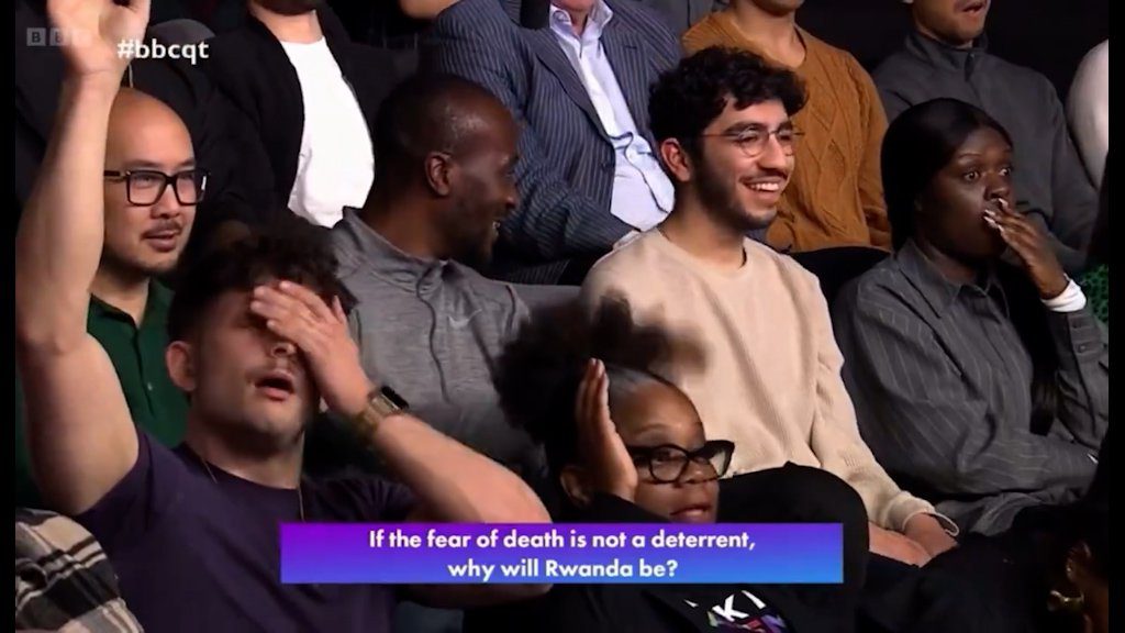 Audience members reacting to Chris Philip's question on BBC Question Time
