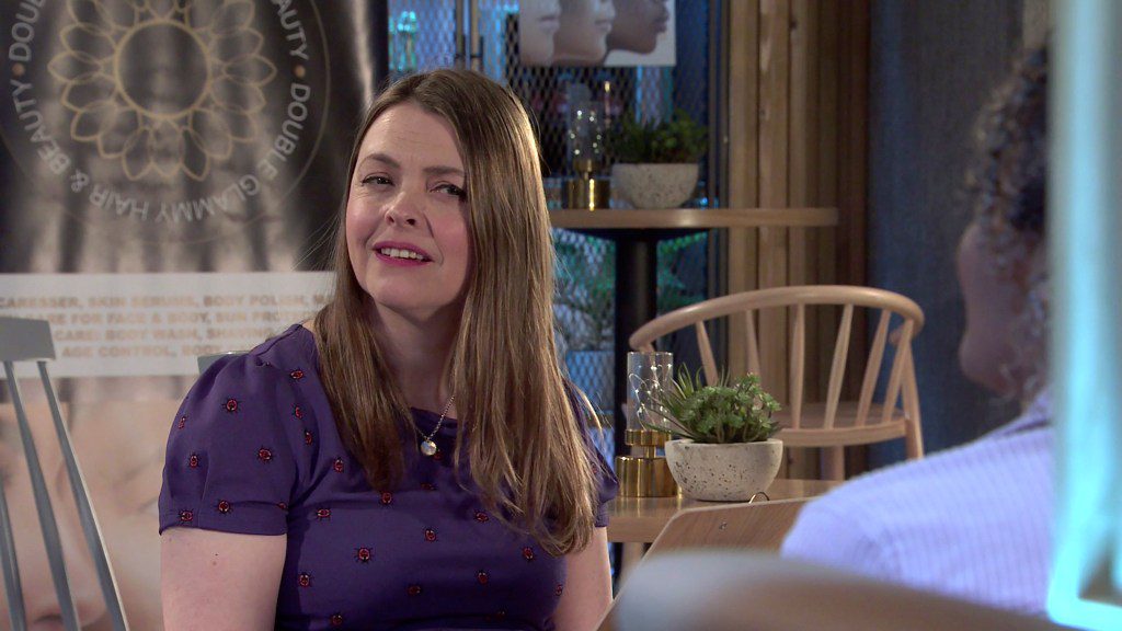 Tracy smirking in Coronation Street