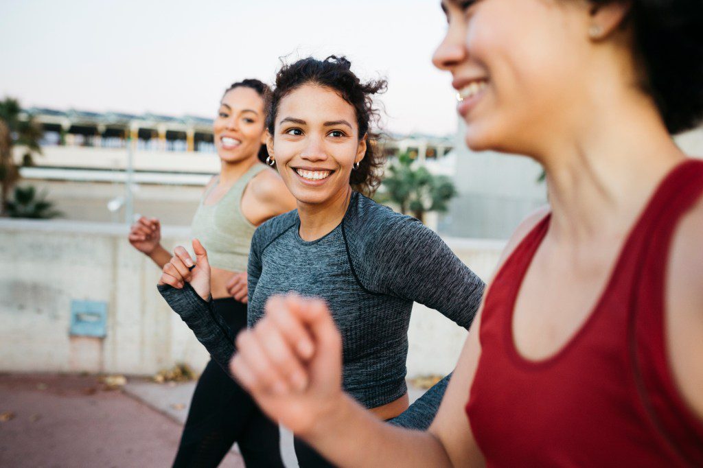 Three woman running