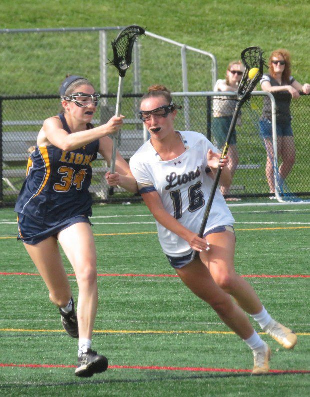 Lower Moreland's Abbie Wasserstrom tries to advance the ball against New Hope-Solebury Wednesday, May 8, 2024. (Ed Morlock/MediaNews Group)