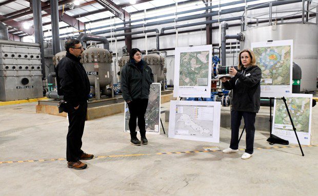 U.S. Rep. Madeline Dean, right, talks about cleanup efforts in her Congressional district with Leslee Everett, center, remedial project manager for the Environmental Protection Agency Region 3, and Adam Ortiz, left, EPA Mid-Atlantic Regional Administrator, during a visit Friday to the Crossley Farm Superfund site in Hereford Township. The EPA manages the groundwater treatment at the site. (BILL UHRICH - READING EAGLE)