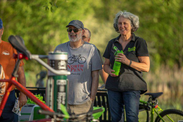 Bike North Penn and Partnership TMA officials watch the dedication of a bicycle repair stand at Stony Creek Park on Thursday, May 2 2024. (Photo by James Short for North Penn Now)