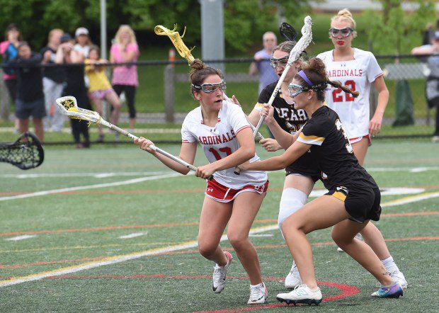 Upper Dublin's Anna DiMartile, 13, with the ball as Upper Moreland's Willow Taylor, 3, defends during their game on Monday, May 6, 2024. (Mike Cabrey/MediaNews Group)