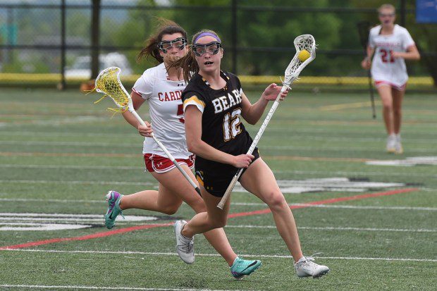 Upper Moreland's Annalise Messina, 12, drives up the field against Upper Dublin during their game on Monday, May 6, 2024. (Mike Cabrey/MediaNews Group)